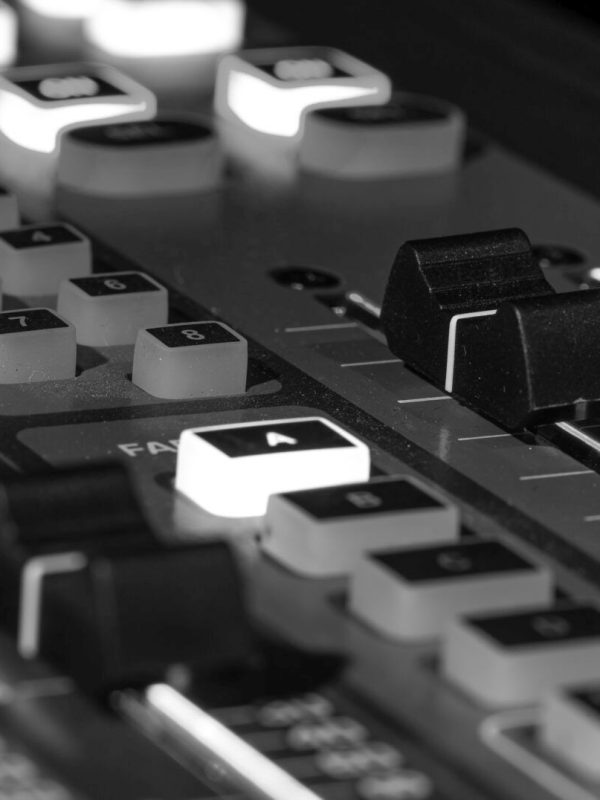 Digital mixer in a recording Studio, close -up. The concept of creativity and show business. Space for text.